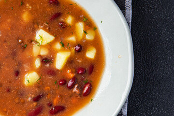 lentils soup beans, vegetable first course fresh healthy meal food snack on the table copy space food background rustic top view 