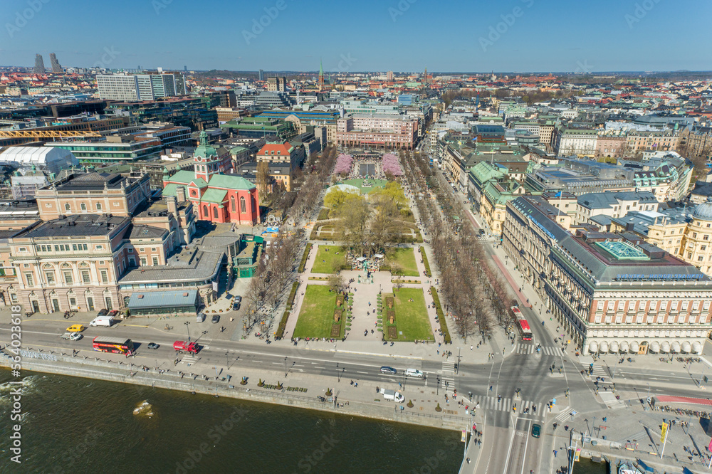 Wall mural stockholm downtown with blooming sakuras trees in background. sweden. drone point of view