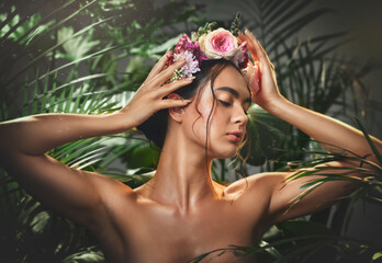 Beauty, skincare and flower crown with woman in a plant jungle for health, wellness and organic...