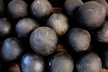 a lot of metal round black balls close-up.