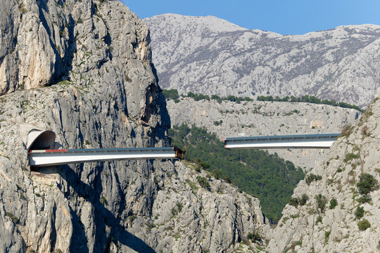 Unfinished bridge in Omis, Croatia over the river Cetina. Bridge being built in between the canyon. Industrial and complex construction in the Dalmatia area. 