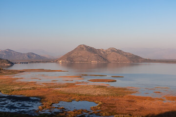 Panoramic view of Lake Skadar National Park in autumn seen from Virpazar, Bar, Montenegro, Balkans, Europe. Travel destination in Dinaric Alps near the Albanian border. Stunning landscape and nature