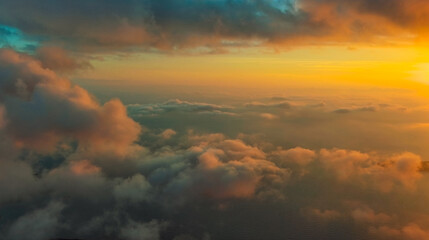 Clouds over sea in sunset colors