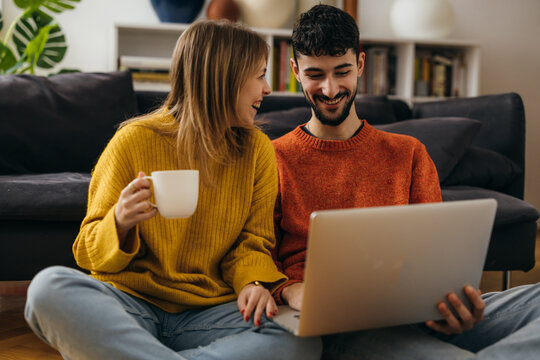 Happy Young Couple Planing A House Budget