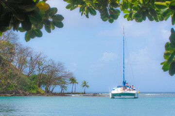 Sailboat on calm blue waters