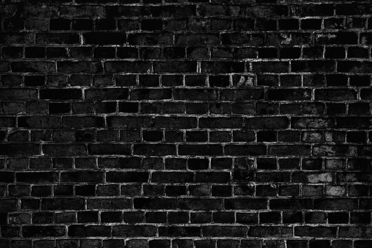 Abstract Black Brick Wall Background. Dark Background From The Texture Of Old, Crumbled Bricks