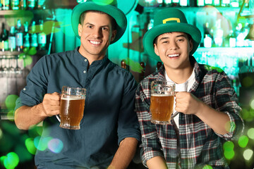 Young men celebrating St. Patrick's Day in pub