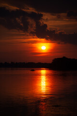 Fototapeta na wymiar Beautiful golden sunset over the South Bug river