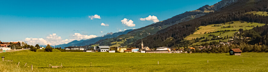 Fototapeta na wymiar Beautiful alpine summer view with a church near Niedernsill, Pinzgau, Salzburg, Austria