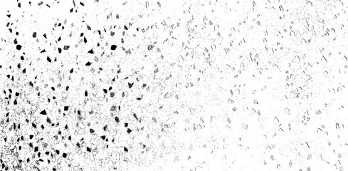 Small uneven spots and particles of debris. Abstract vector texture. Distressed uneven background. Grunge texture overlay with fine grains isolated on white background. Vector illustration. EPS10.
