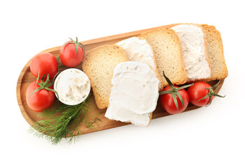 Wooden board of bread rusks with tasty cream cheese and tomatoes on white background