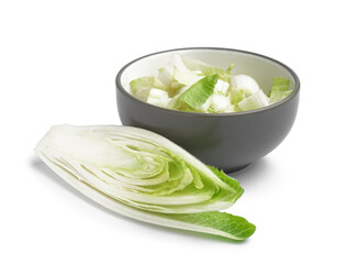 Bowl of cut endive on white background