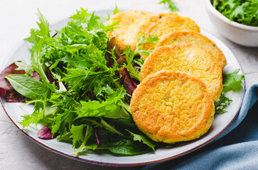 Tofu Patties, Fritters, Vegetarian Food, Vegan Soy Bean Pancakes, Savory Appetizer with fresh salad on a plate