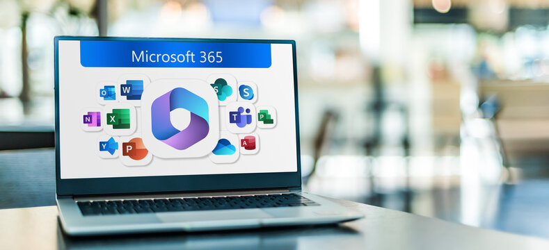 Laptop computer displaying logos of Microsoft 365