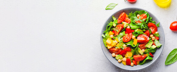 Vegetable Salad, Healthy Eating, Vegetarian Salad with Chickpeas, Avocado, Pepper, Spinach, Cherry Tomatoes in a Bowl