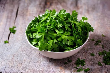  organic parsley leaves close up in a bowl on wooden surface
