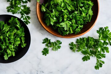 fresh parsley leaves in wooden bowl and black bowl on flat surface top view
