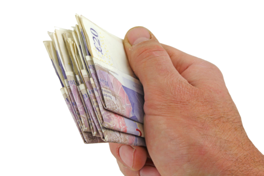 A male hand holding folded twenty pounds notes , transparent png