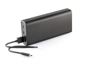 Obraz premium Additional self-contained external battery for charging mobile and other device. Power bank isolated on white background. Stylish charger (rechargeable battery). Full depth of field.