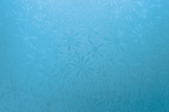 shiny cool blue background texture with embossed flowers