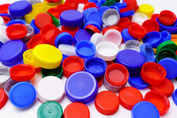 many colored caps of plastic bottles