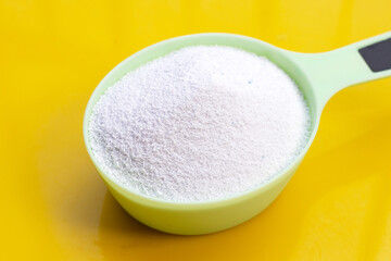 Detergent powder for clothes washing. Laundry concept.