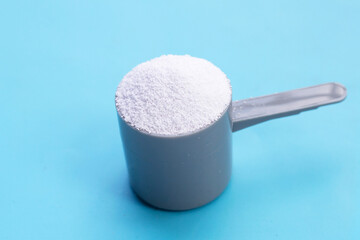 Detergent powder for clothes washing. Laundry concept.