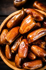 Ripe dates on a plate. 