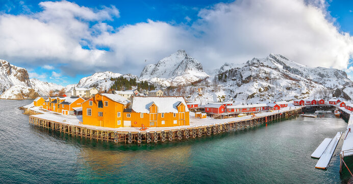 Amazing morning seascape of Norwegian sea and cityscape of Nusfjord village.