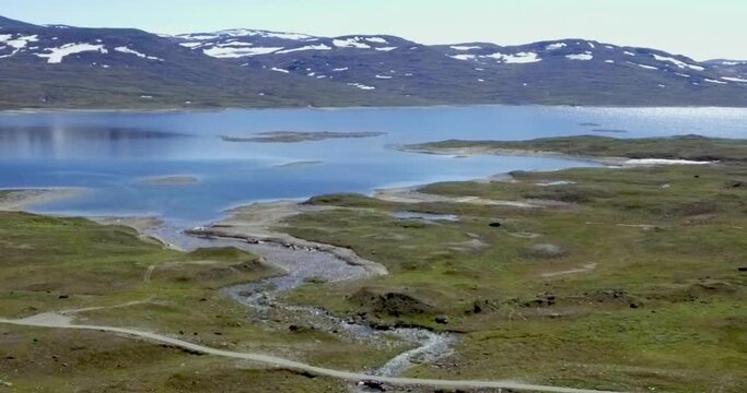 Aerial view of fell landscape at lake Guolasjavri reservoir in summer, Birtavarre, Troms og Finnmark, Norway.