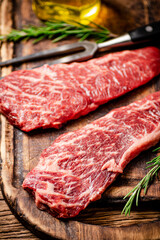 Raw steak on a cutting board. 