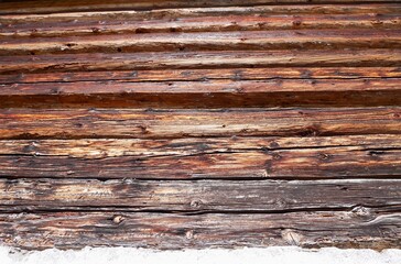Weathered wood paneling of old farmhouse.