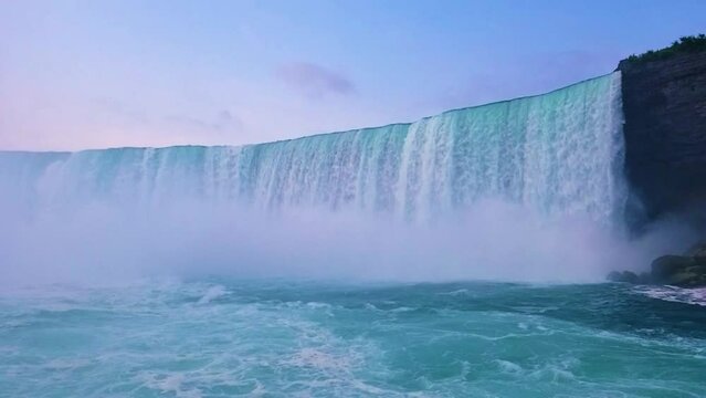 Niagara Falls (Slow motion): Horseshoe Falls (Canada) with beautiful sunset