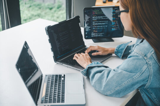 Female programmer working on coding, software development and web design.Concept technology development.