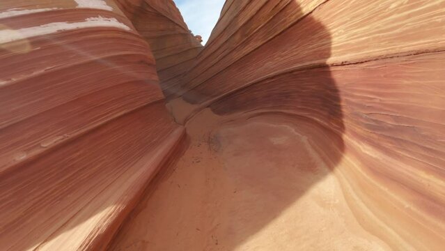 The Wave POV unique sandstone hike at Coyote Buttes wilderness Arizona Utah border USA. 