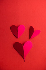 hand cut hearts over red