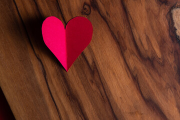 Fototapeta premium Red hearts on wood