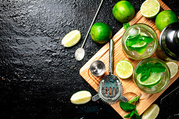 Mojito with pieces of lime and mint leaves. 