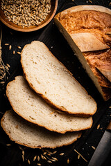 Sliced wheat bread on a cutting board. 