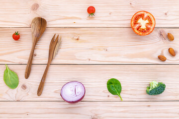 Food background and salad concept with raw ingredients  flat lay on white wooden background.