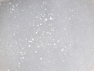 Hand painted watercolor splashes of colorful colors on white paper. Dotted grainy background. Trendy grunge design for decoration, gift paper, prints, covers