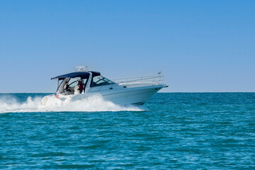 Fun by speedboat on Lake Michigan. - Powered by Adobe