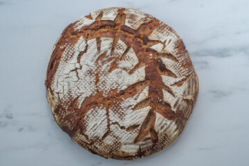 Homemade bread on rustic wooden 