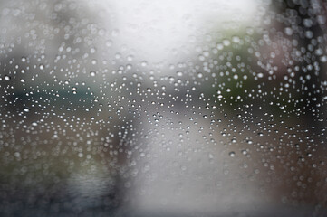 Rain drops on mirror car.