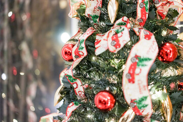 Christmas tree close-up decoration background. Fragment of a christmas and New Year. Festive christmas decorations.