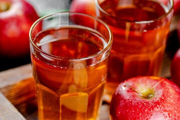 Apple juice on a wooden tray. 
