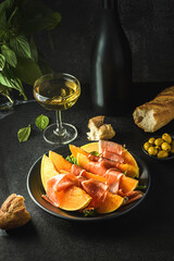 melon with parma and olives