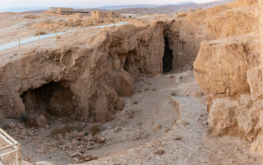 View  before sunrise of the remains of a water cistern in the ruins of the fortress of Masada, the...