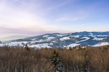 view from platform Wisenberg in Switzerland on a sunny winter morning with a few clouds