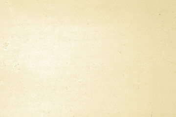 光があたる古い大きな金属の板